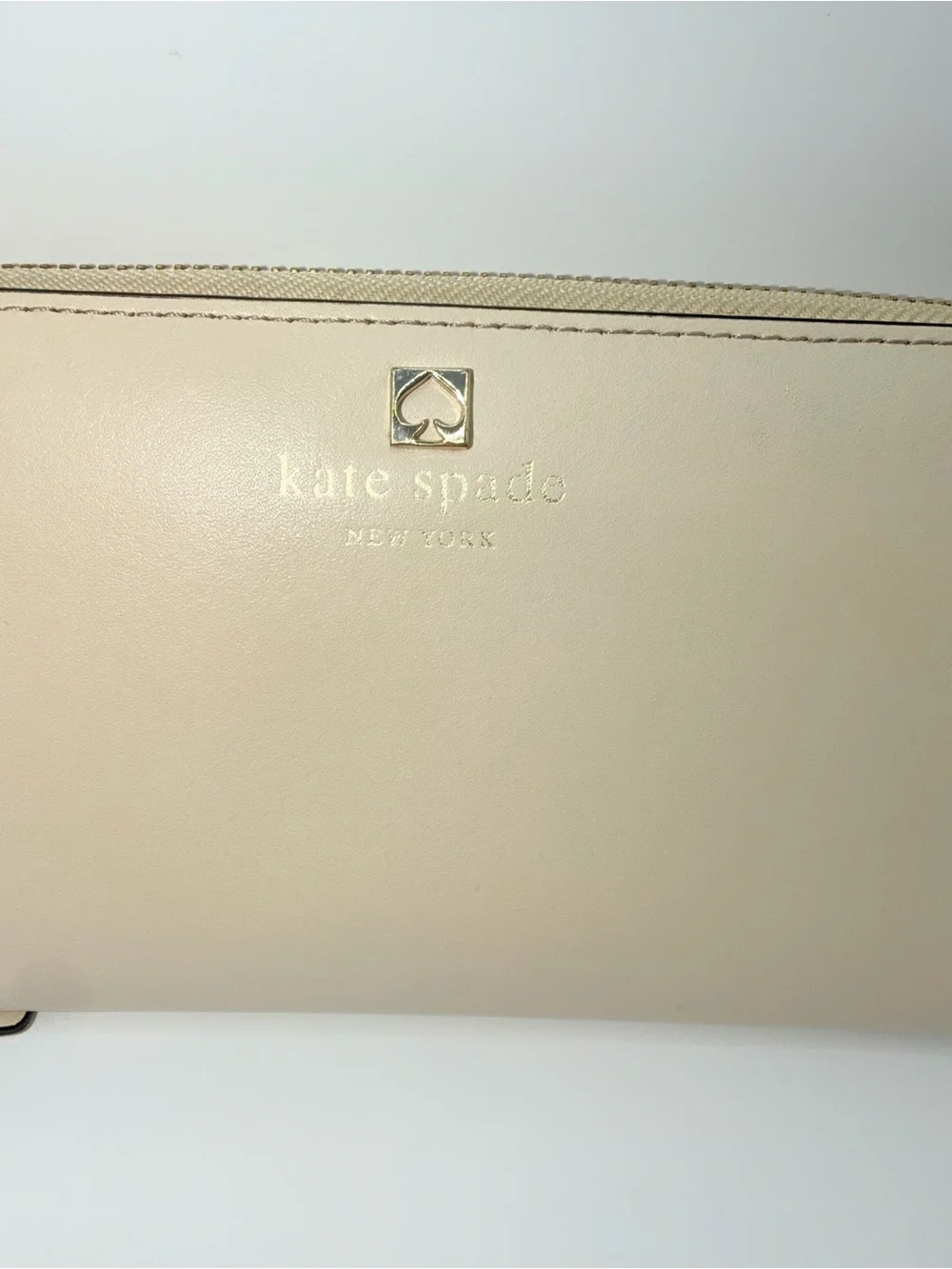 kate spade New York Cream Zip-Around Leather Wallet